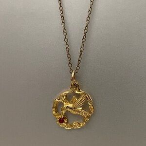 Vintage hummingbird signed JJI earrings and a pendant.